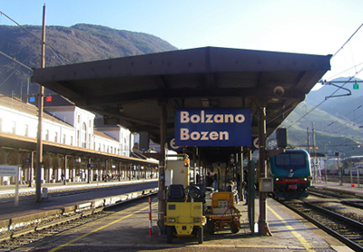 https://static.digitaltravelcdn.com/bucket/g0wqq4s/bolzano-train-station.jpg
